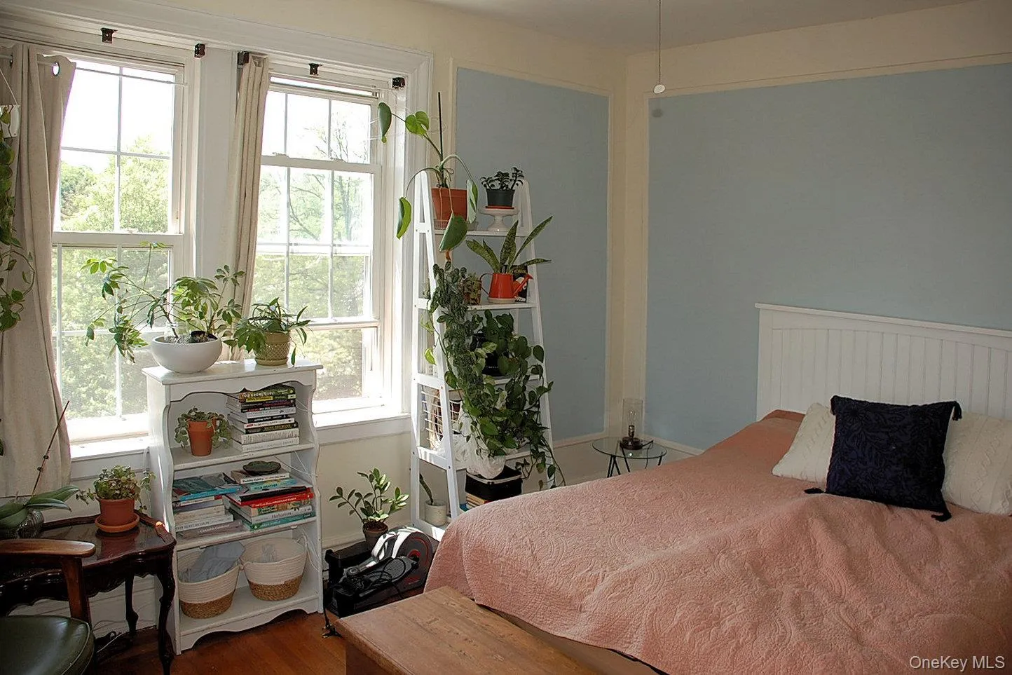 Bedroom with dark wood-style floors Bedroom with dark wood-style floors