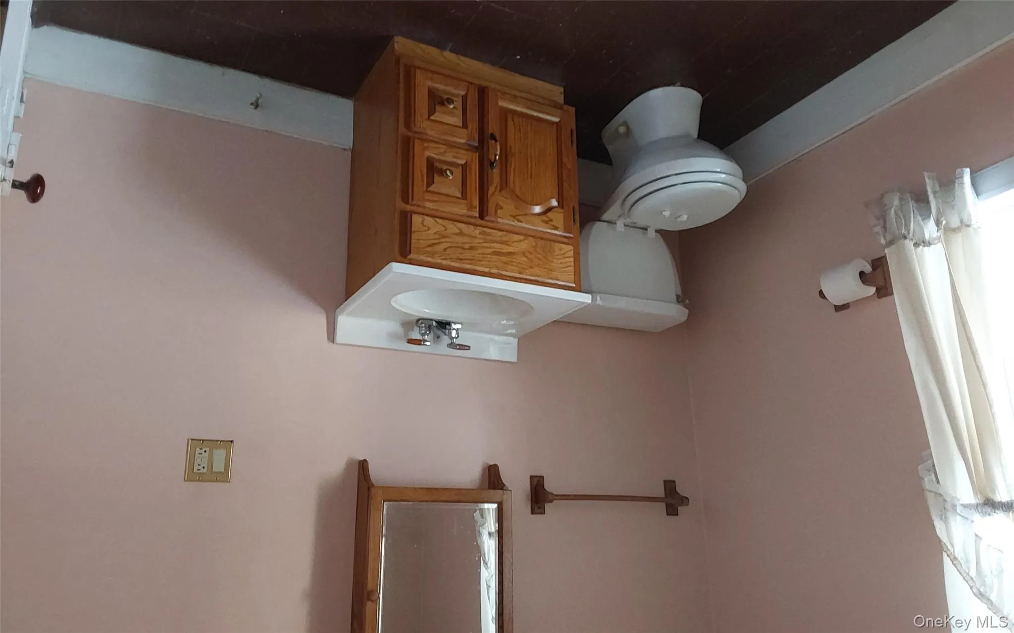 Bathroom featuring vanity and toilet Bathroom featuring vanity and toilet