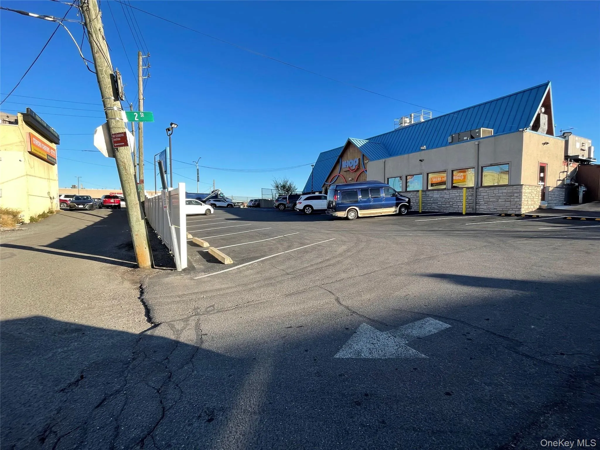 View of uncovered parking lot View of uncovered parking lot
