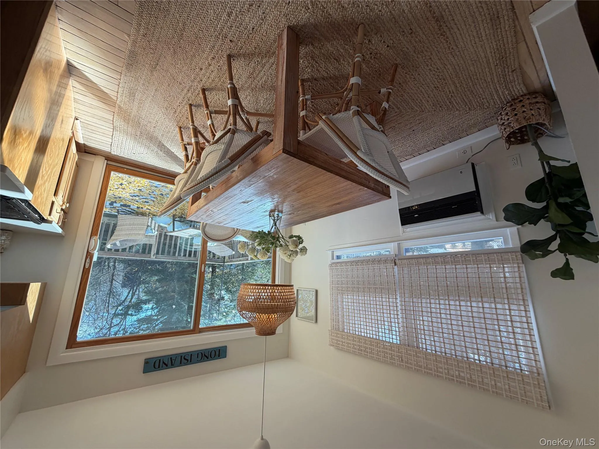 Dining space featuring heating unit and baseboards Dining space featuring heating unit and baseboards