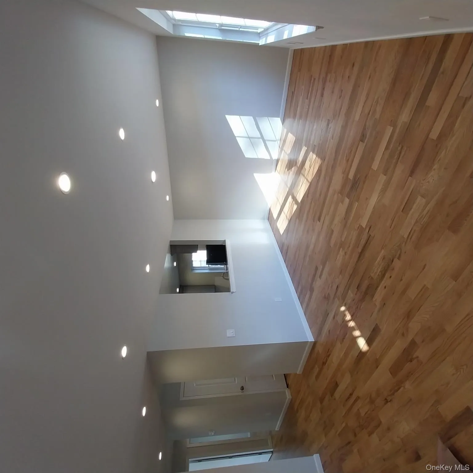 Empty room with recessed lighting and light wood-type flooring Empty room with recessed lighting and light wood-type flooring