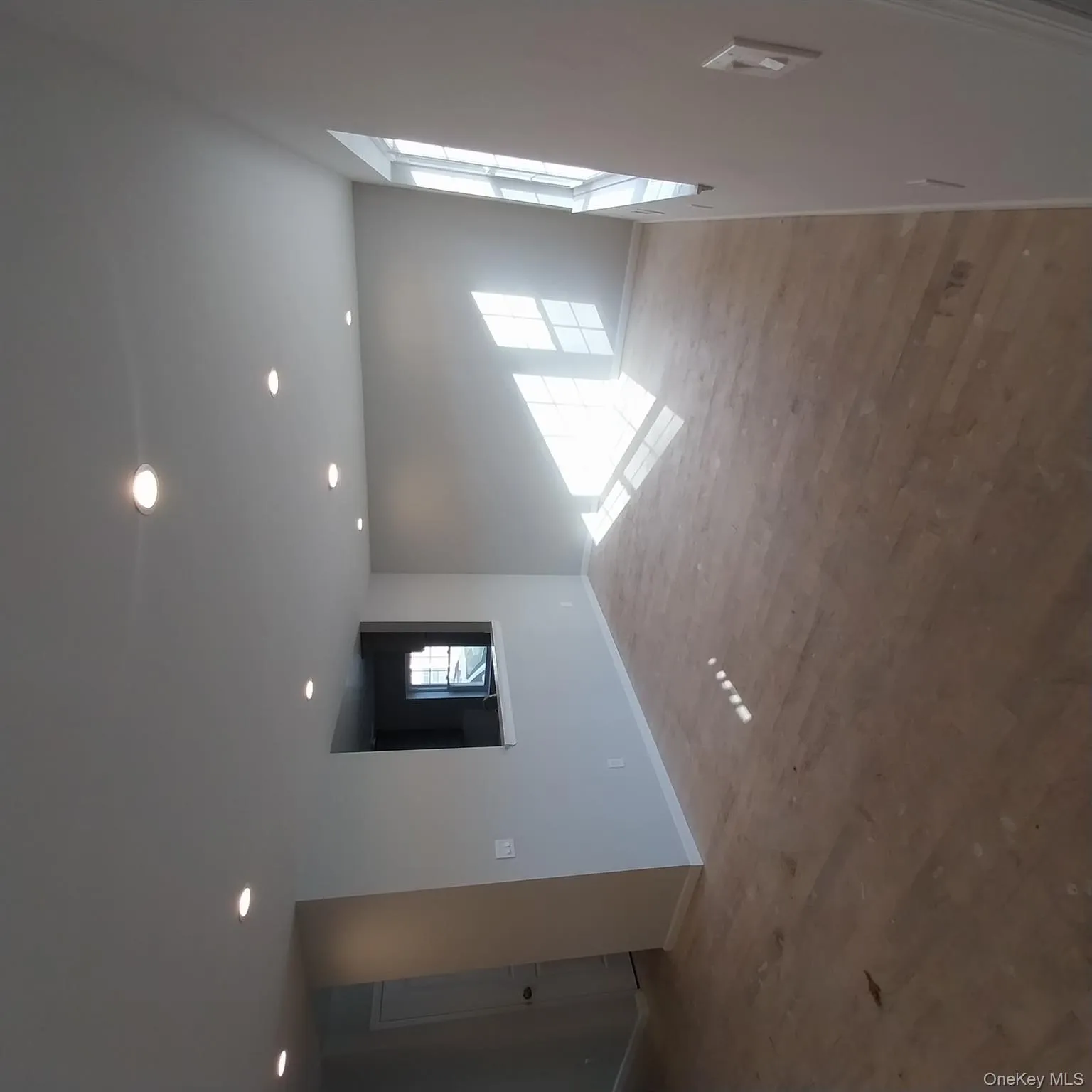 Empty room with recessed lighting and light wood-type flooring Empty room with recessed lighting and light wood-type flooring