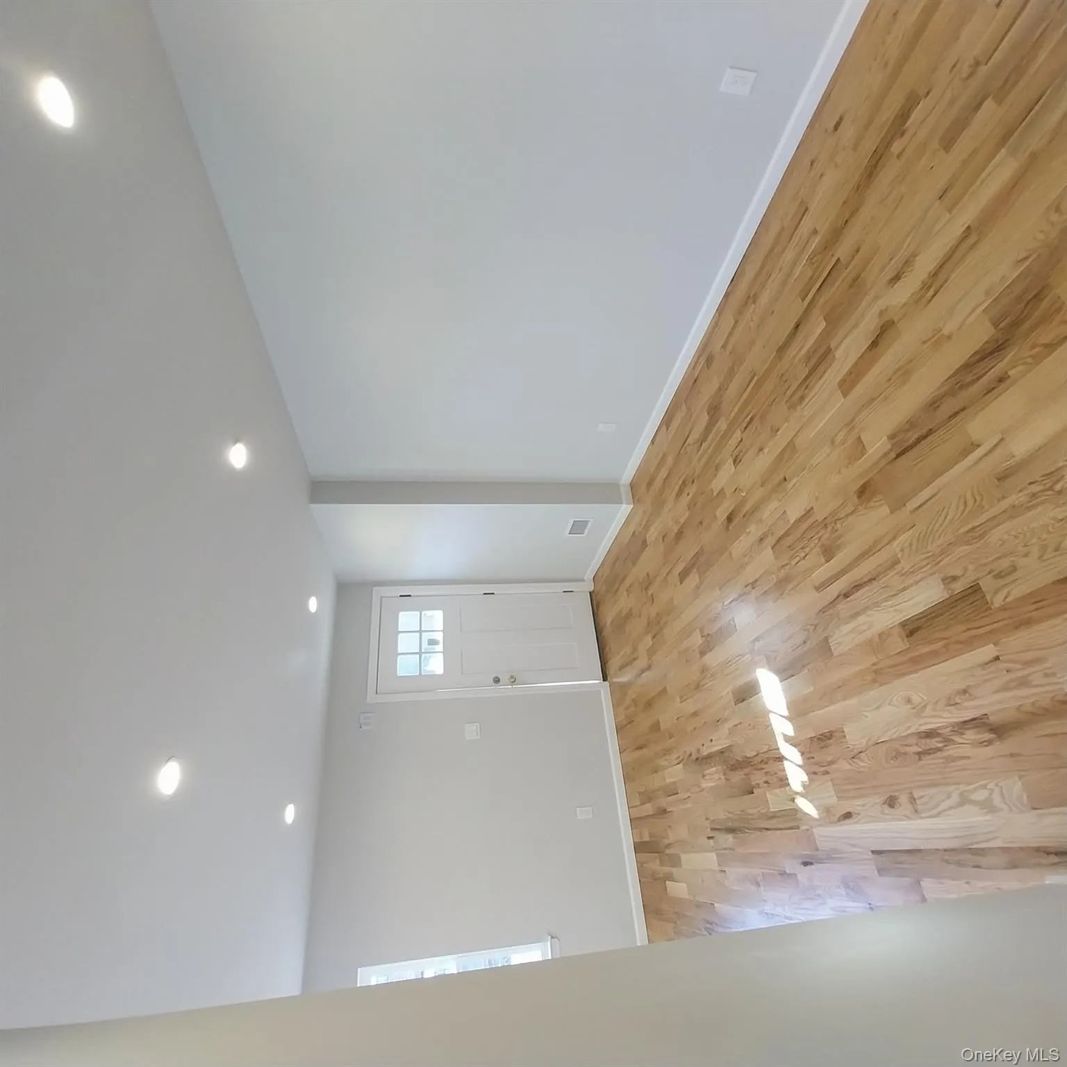 Entryway featuring recessed lighting and light wood-type flooring Entryway featuring recessed lighting and light wood-type flooring
