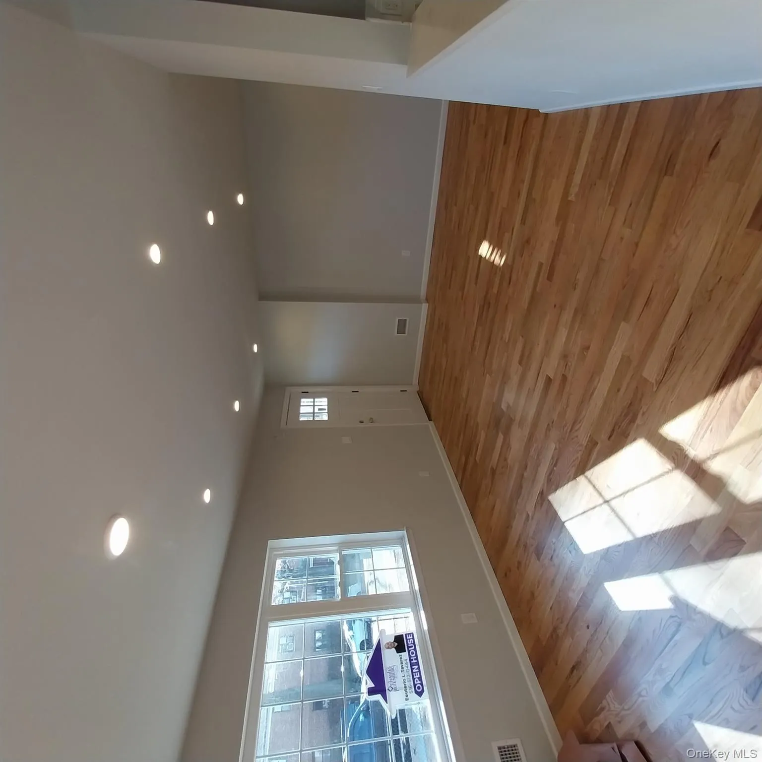 Foyer entrance featuring recessed lighting and light wood-style flooring Foyer entrance featuring recessed lighting and light wood-style flooring