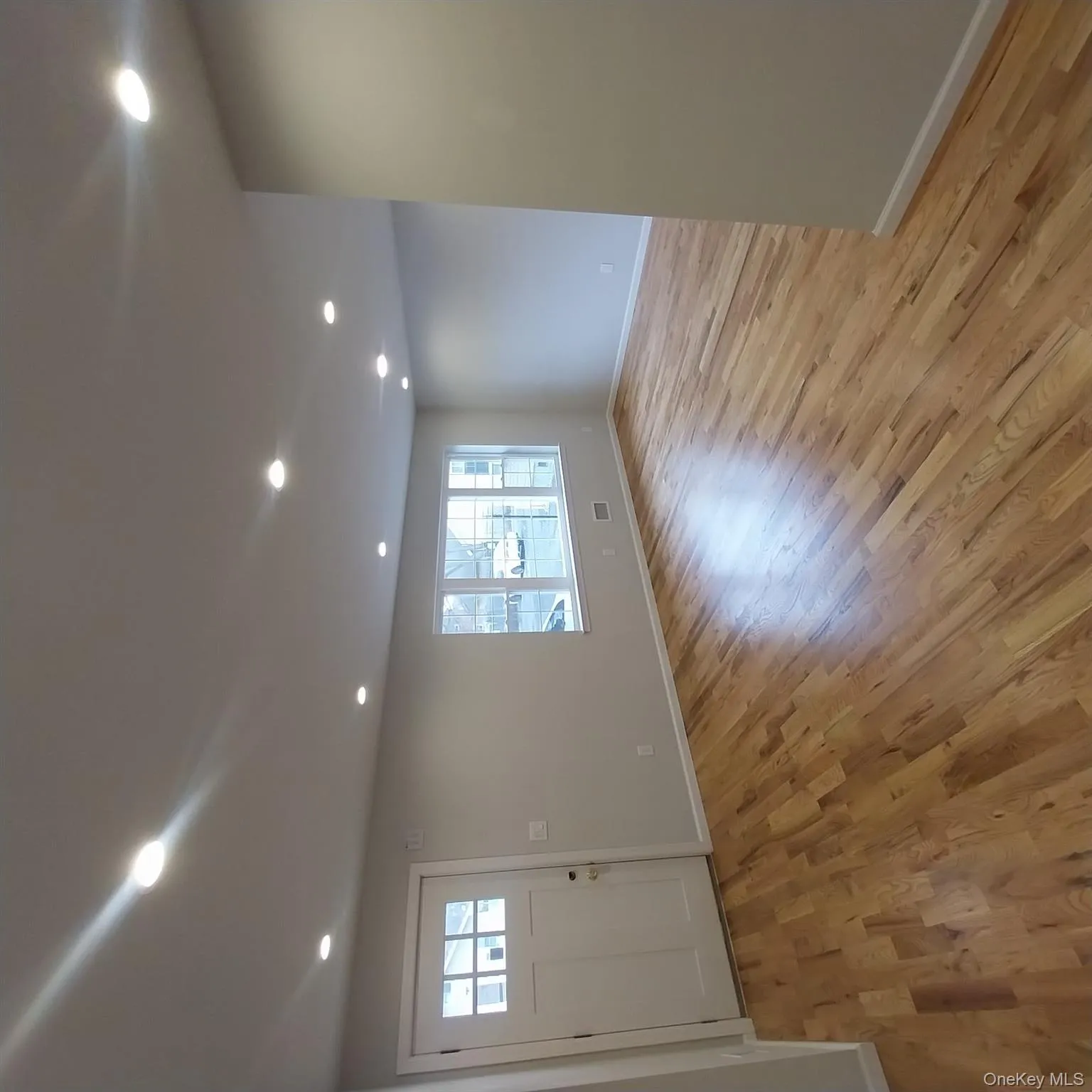 Entrance foyer featuring recessed lighting and light wood-style flooring Entrance foyer featuring recessed lighting and light wood-style flooring