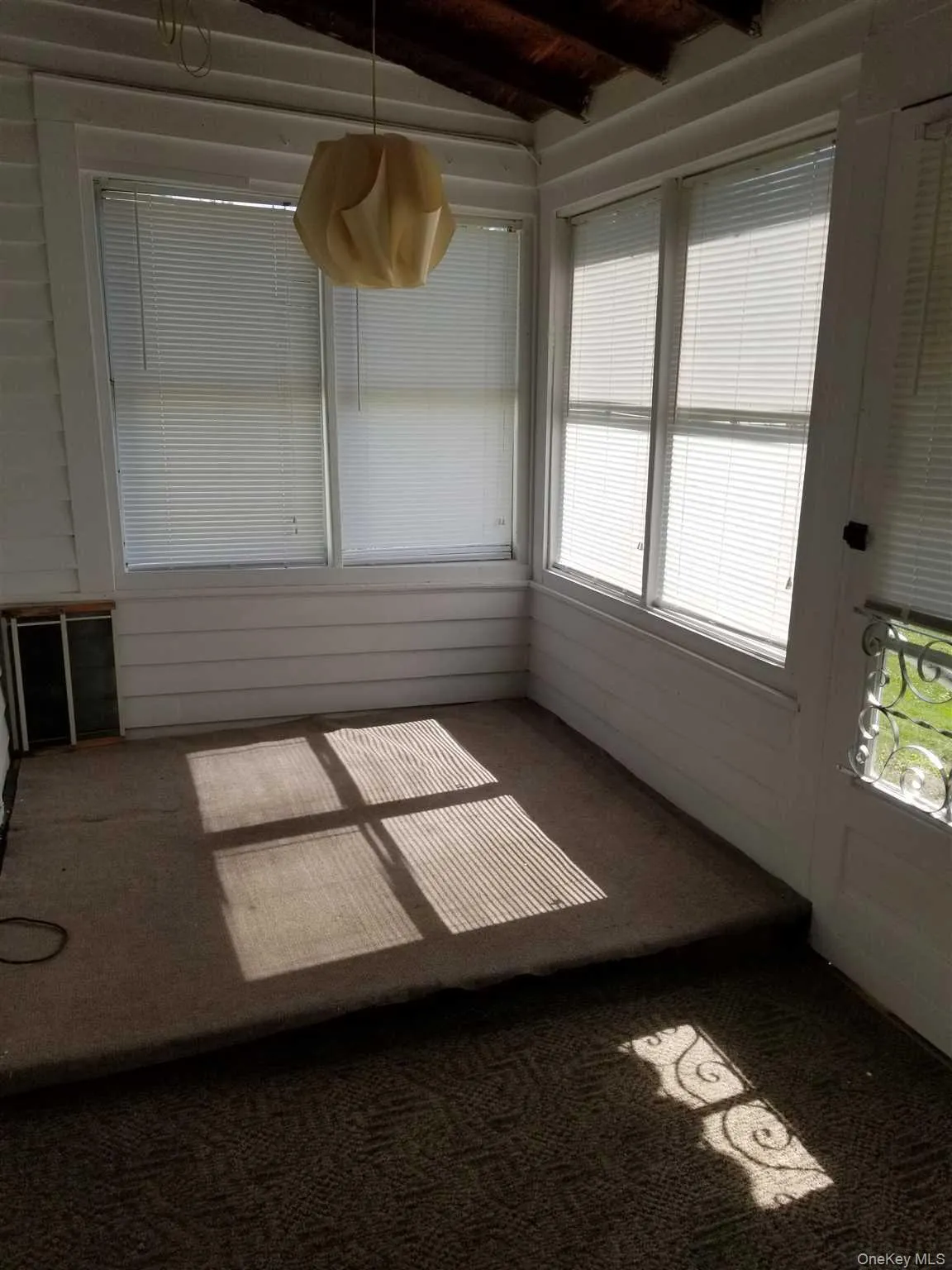 Back Porch/Sunroom leads to large fenced in back yard Back Porch/Sunroom leads to large fenced in back yard