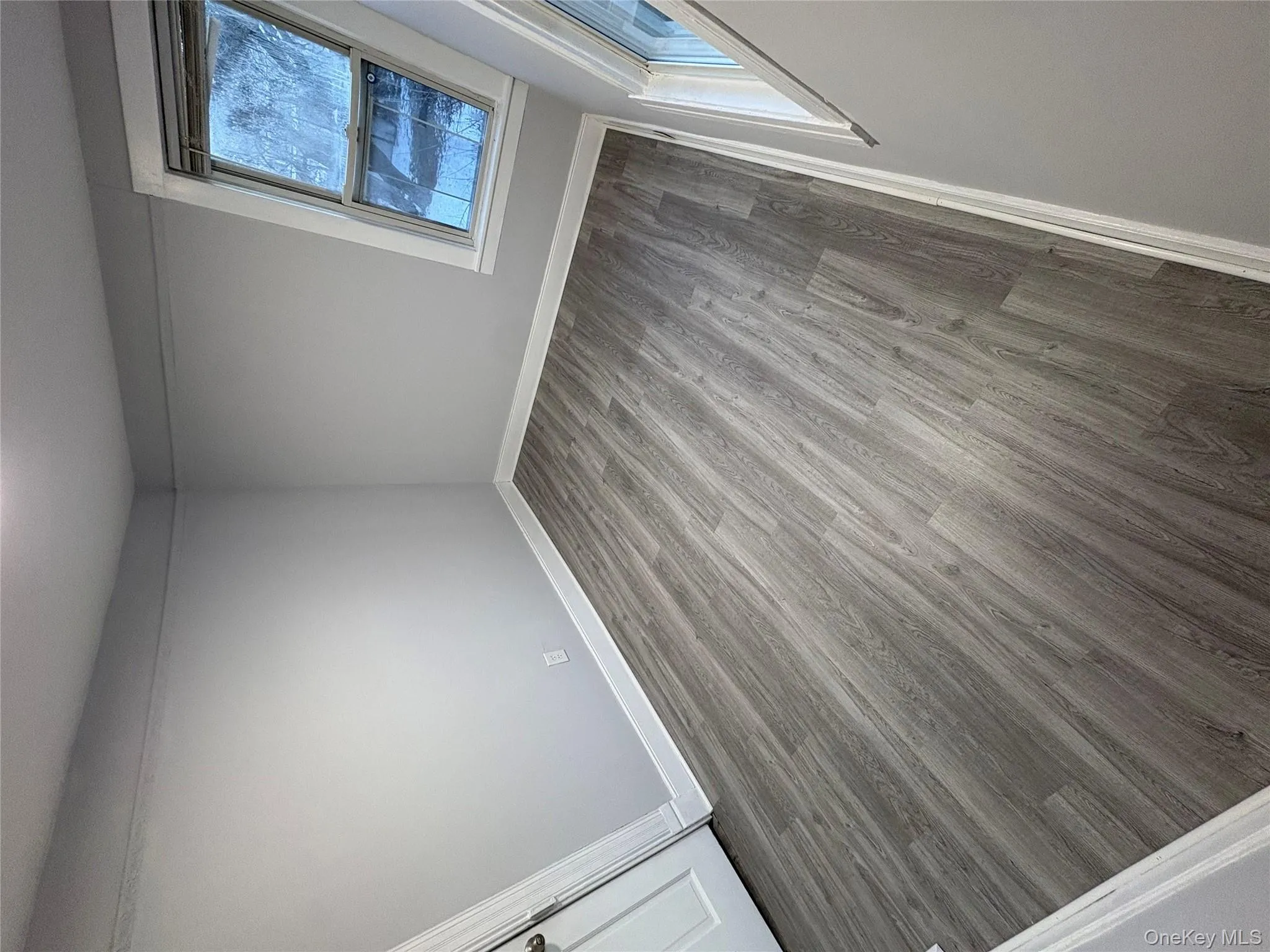 Freshly painted BR in contemporary colors with new vinyl plank floors Freshly painted BR in contemporary colors with new vinyl plank floors