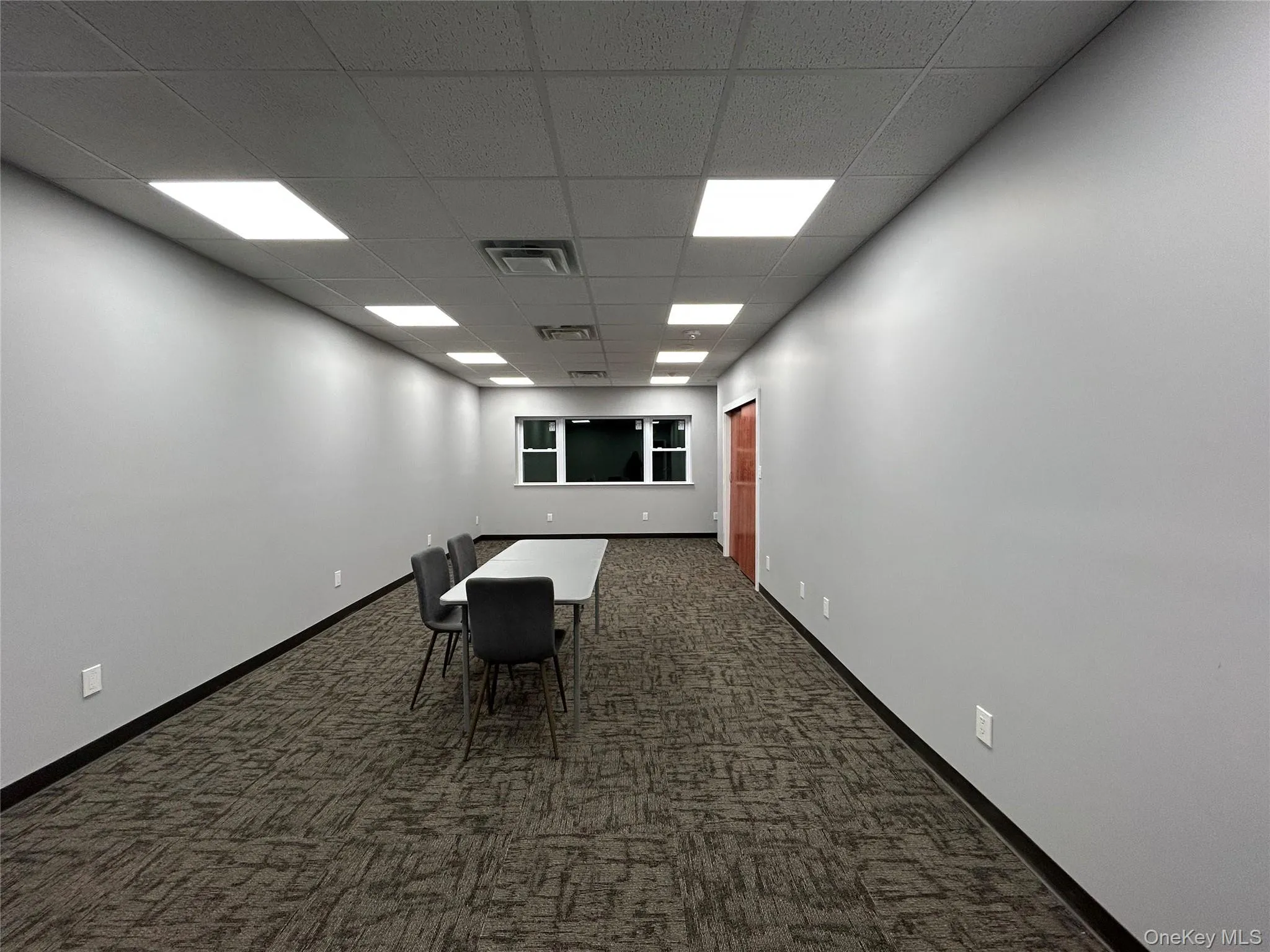 Office with a drop ceiling Office with a drop ceiling