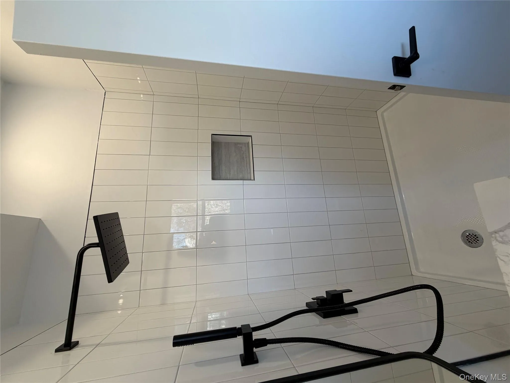 Bathroom with tiled shower Bathroom with tiled shower