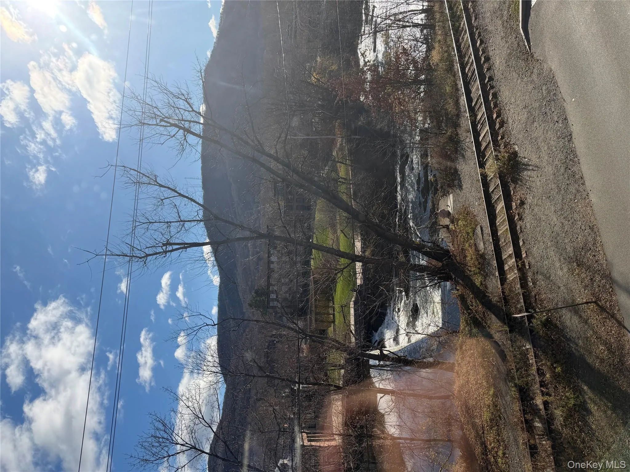 Mountain view featuring a nearby body of water Mountain view featuring a nearby body of water