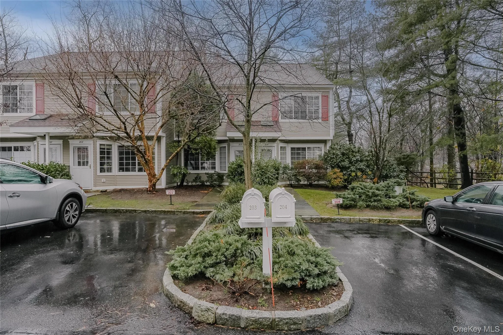 View of front facade with uncovered parking View of front facade with uncovered parking