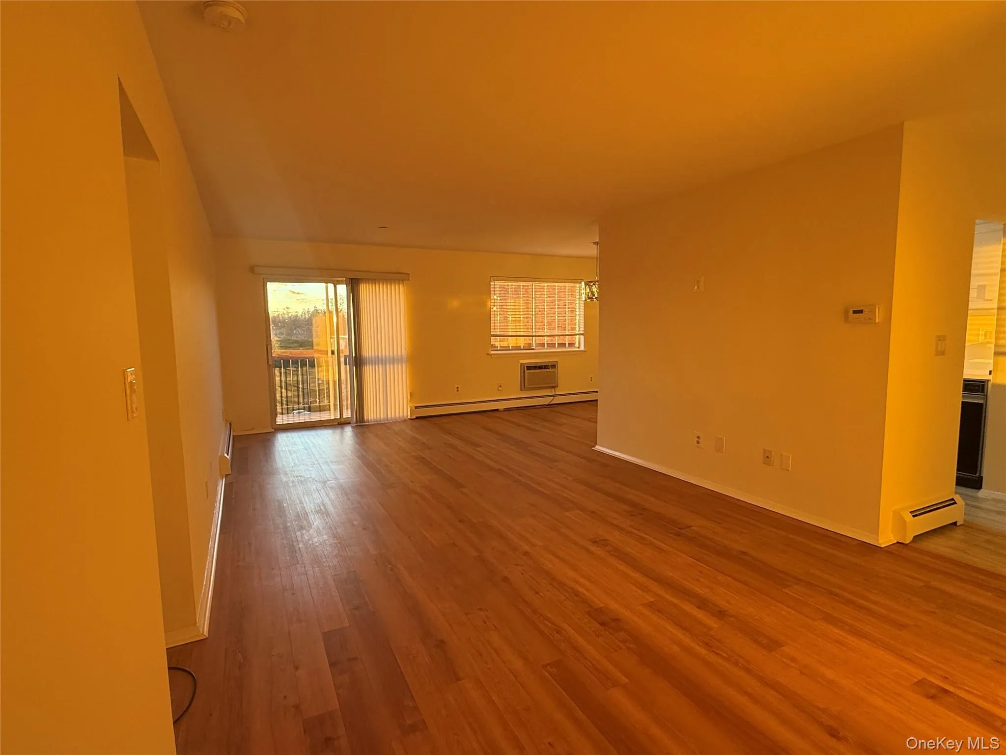 Beautifully finished hardwood flooring and sliders to balcony Beautifully finished hardwood flooring and sliders to balcony