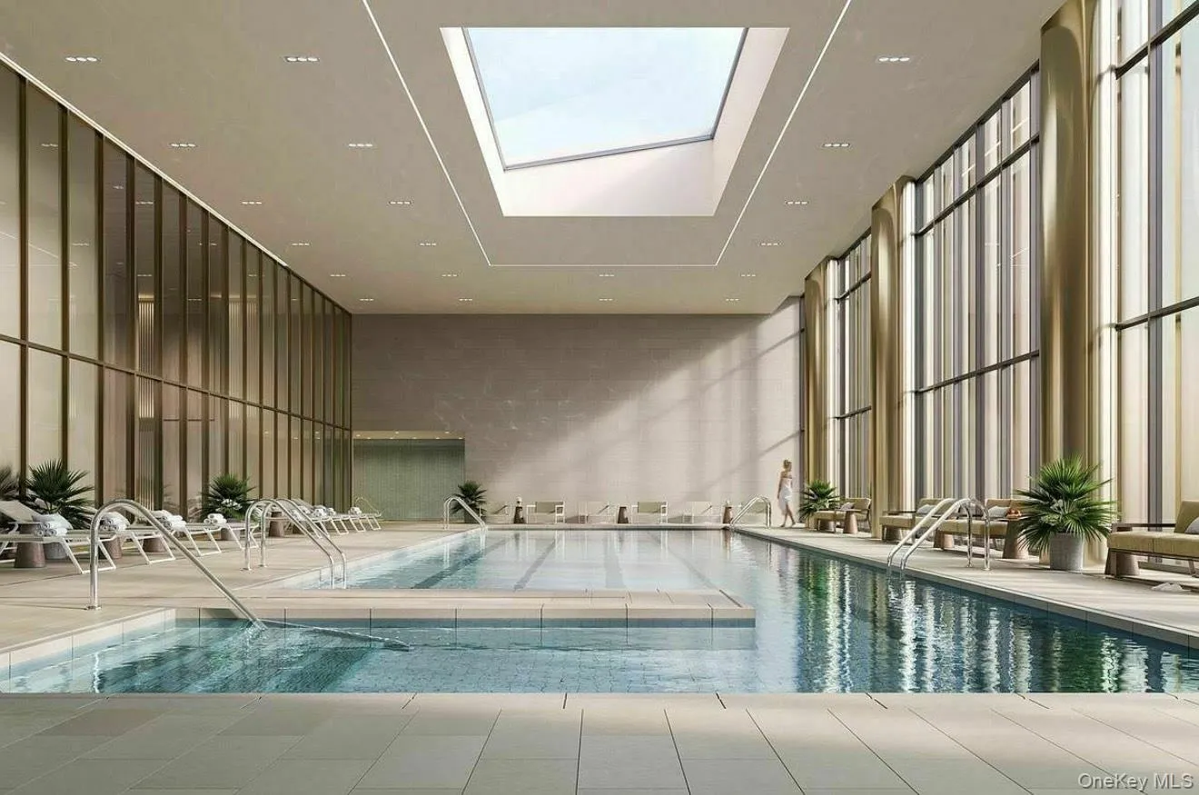 Indoor community pool with a skylight Indoor community pool with a skylight