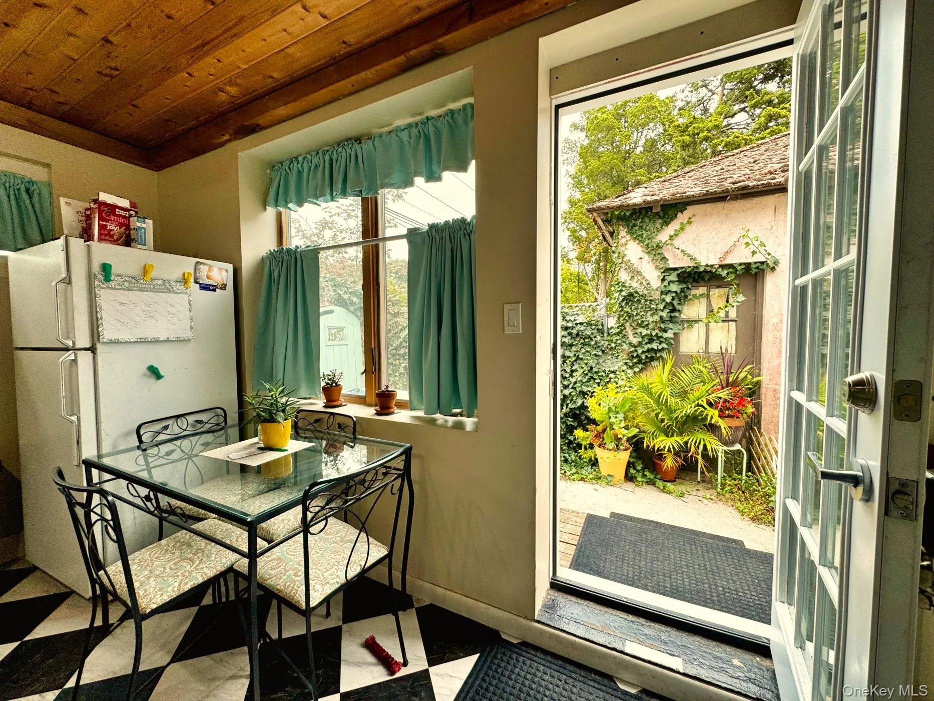 Charming eat-in Kitchen w/ Private Patio Charming eat-in Kitchen w/ Private Patio