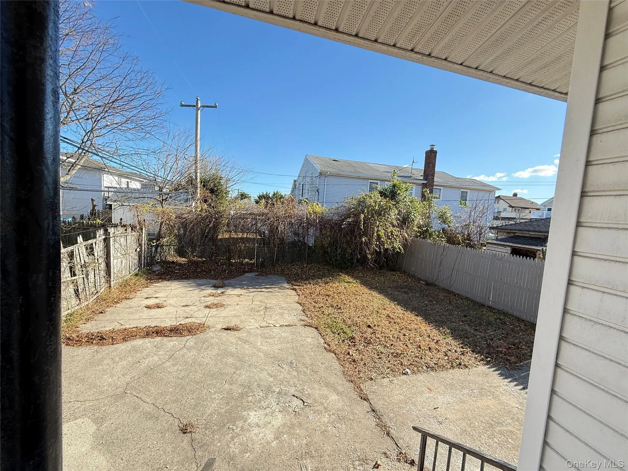 Fenced backyard featuring a patio Fenced backyard featuring a patio