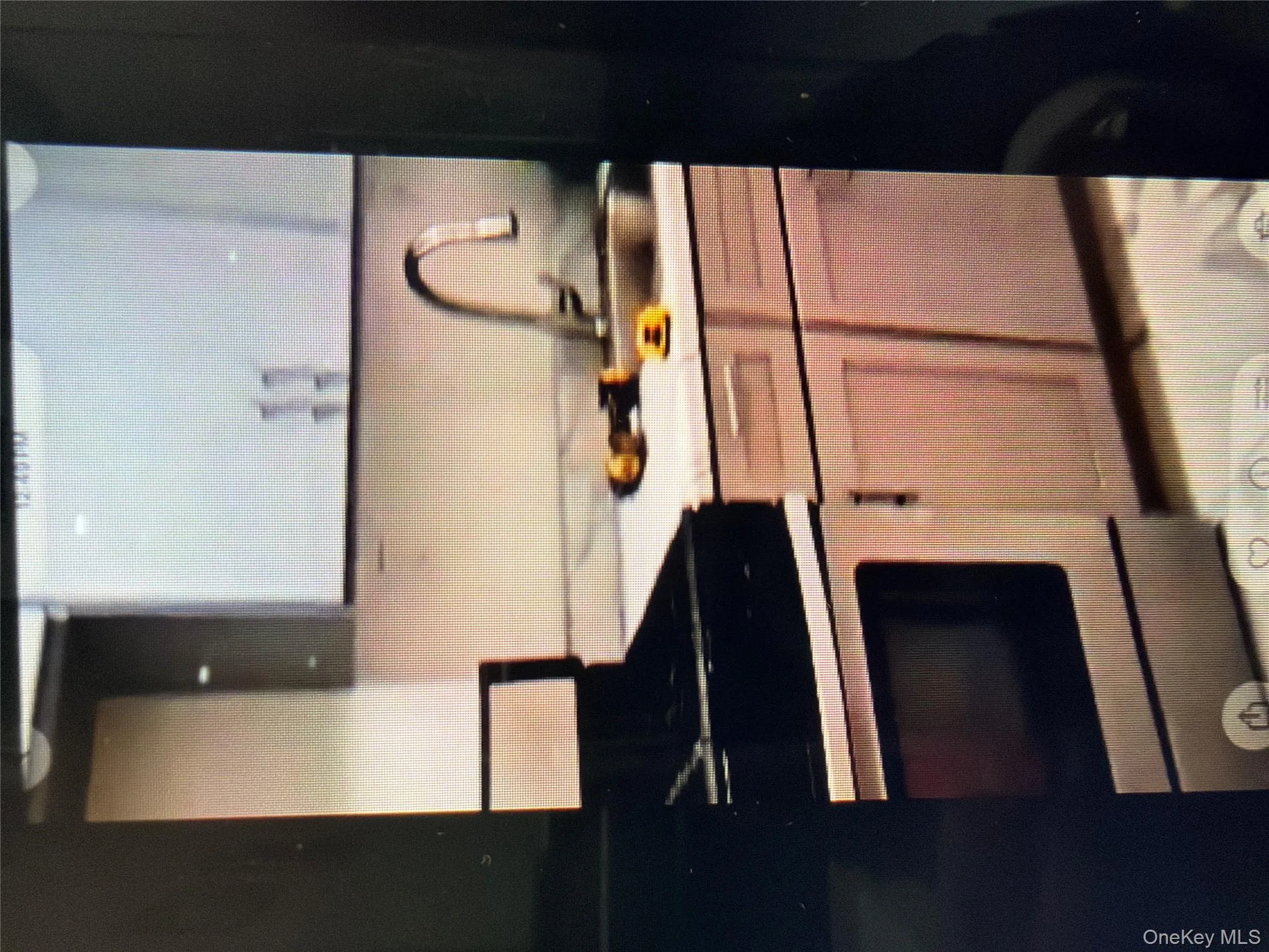 Kitchen with light countertops and range Kitchen with light countertops and range