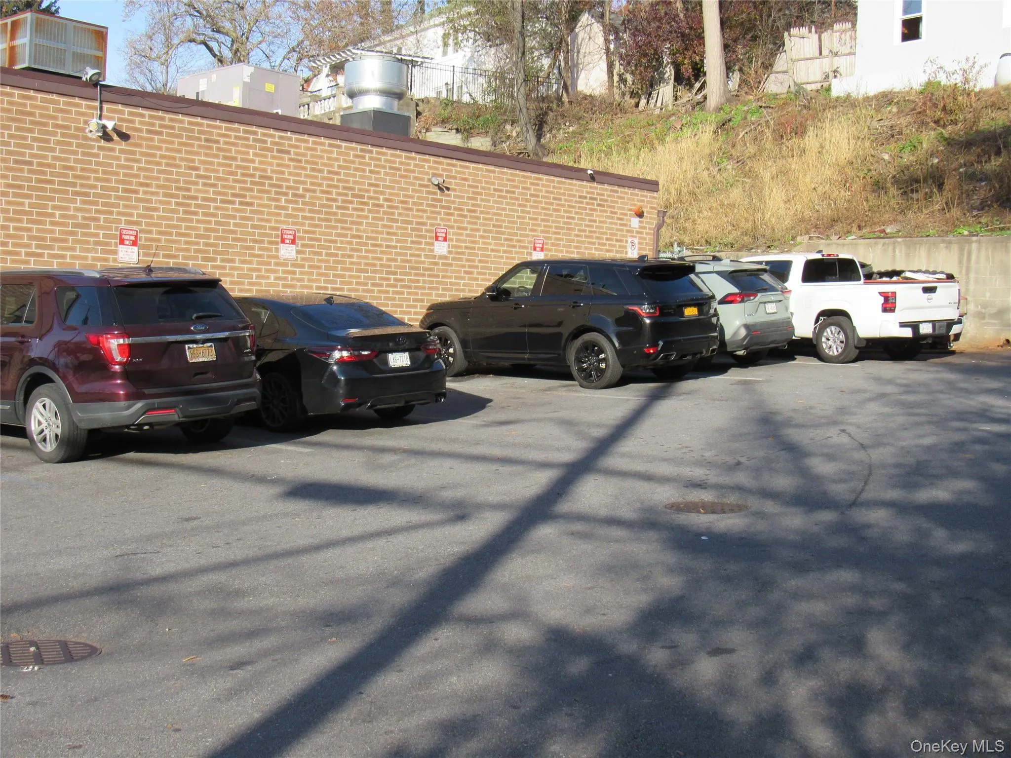 View of uncovered parking lot View of uncovered parking lot