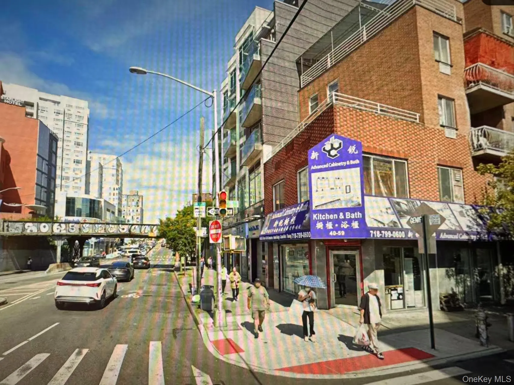 View of property featuring parking View of property featuring parking