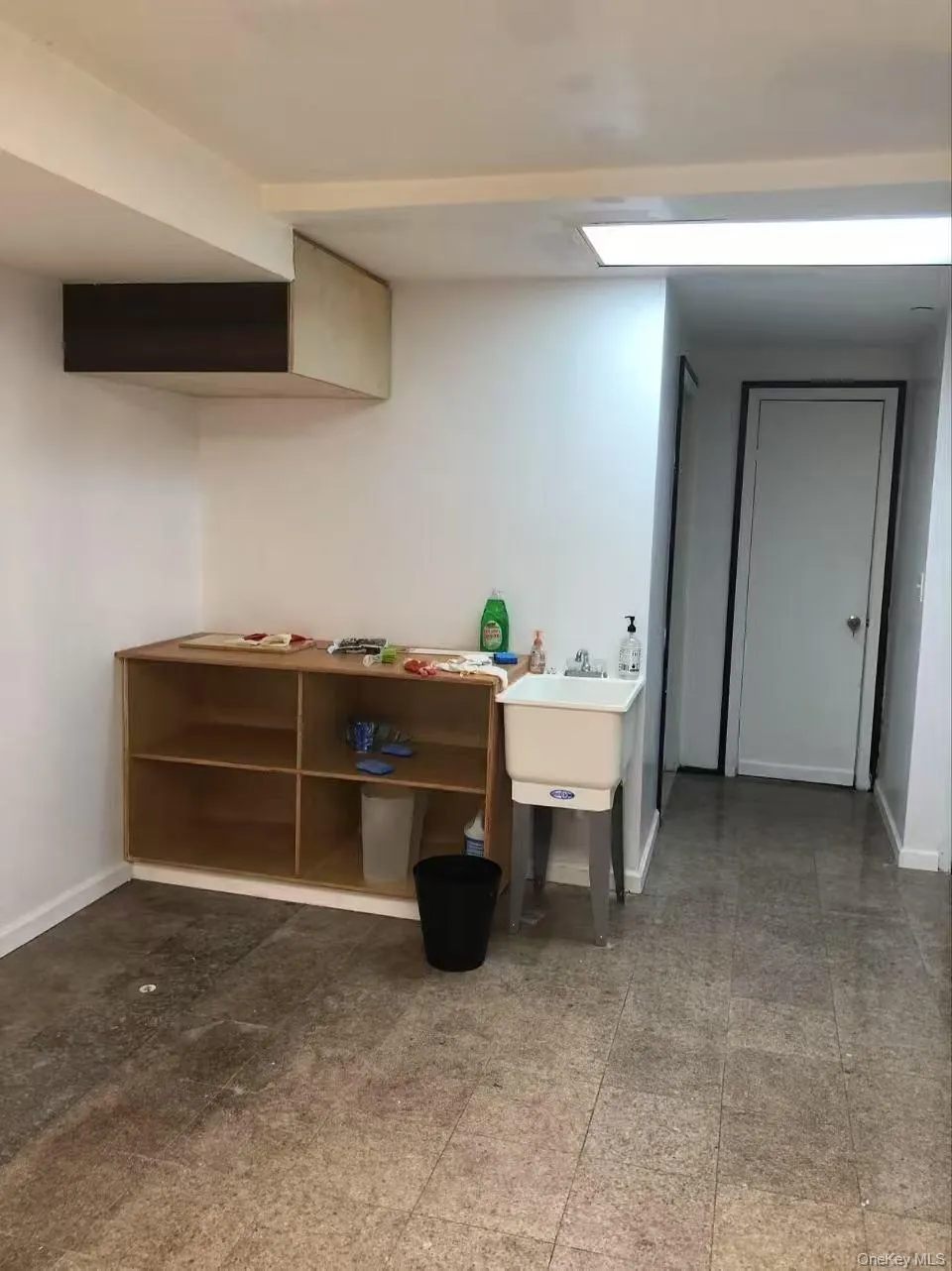 Basement featuring baseboards Basement featuring baseboards