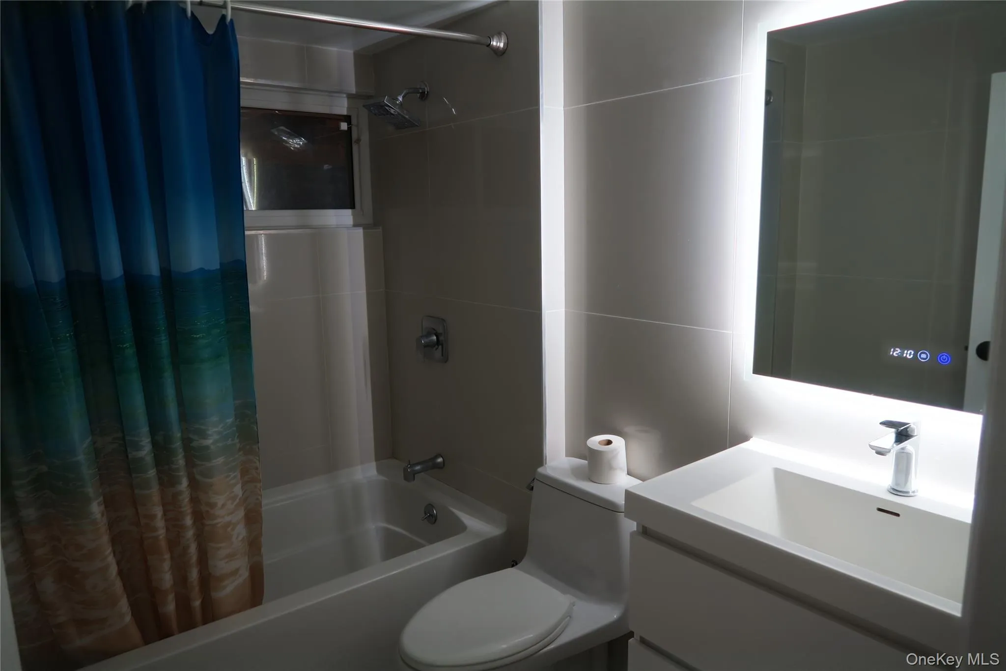 Full bathroom with shower / bath combo and vanity Full bathroom with shower / bath combo and vanity