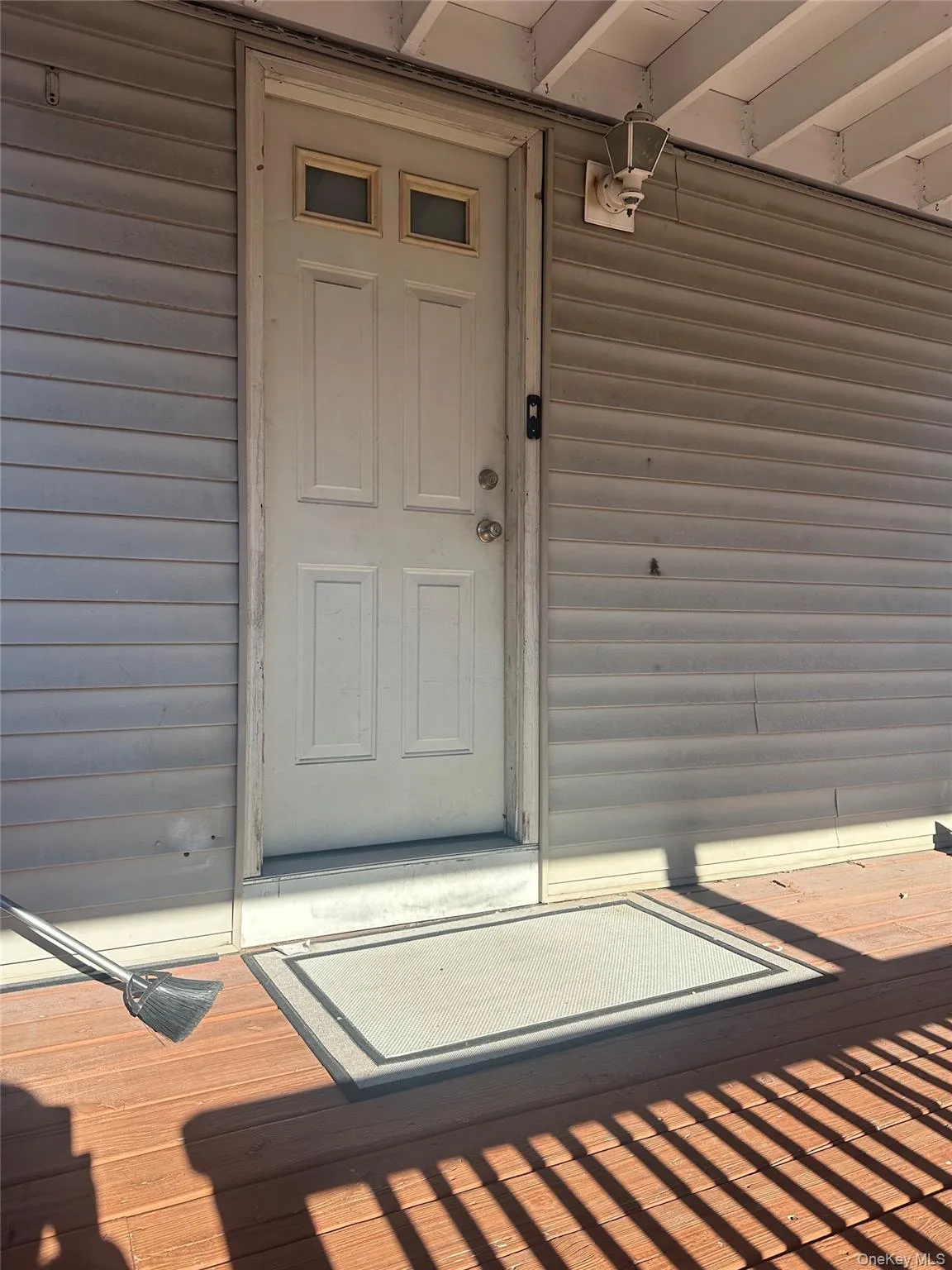 View of exterior entry with a deck View of exterior entry with a deck