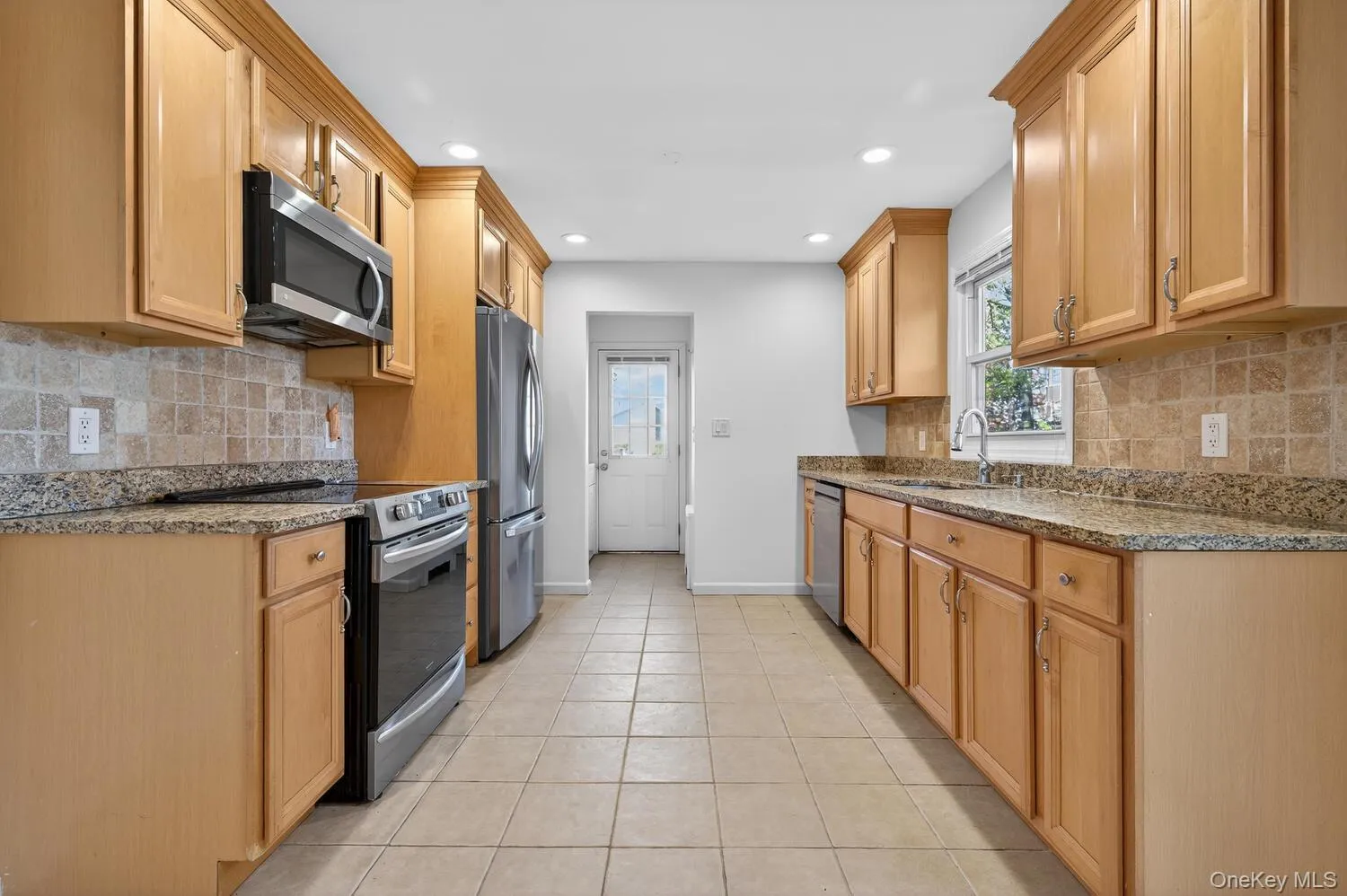 Full Kitchen, Stainless Steel Appliances, Access to Garage, Side Entry and French Doors to Rear Patio Full Kitchen, Stainless Steel Appliances, Access to Garage, Side Entry and French Doors to Rear Patio