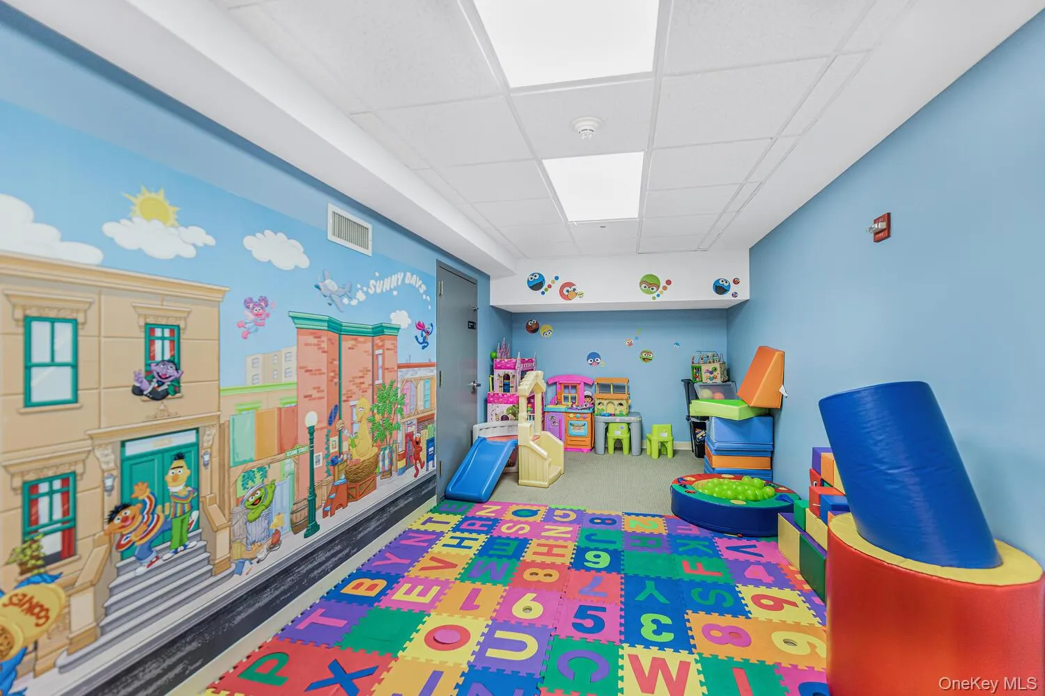 Rec room featuring a drop ceiling Rec room featuring a drop ceiling