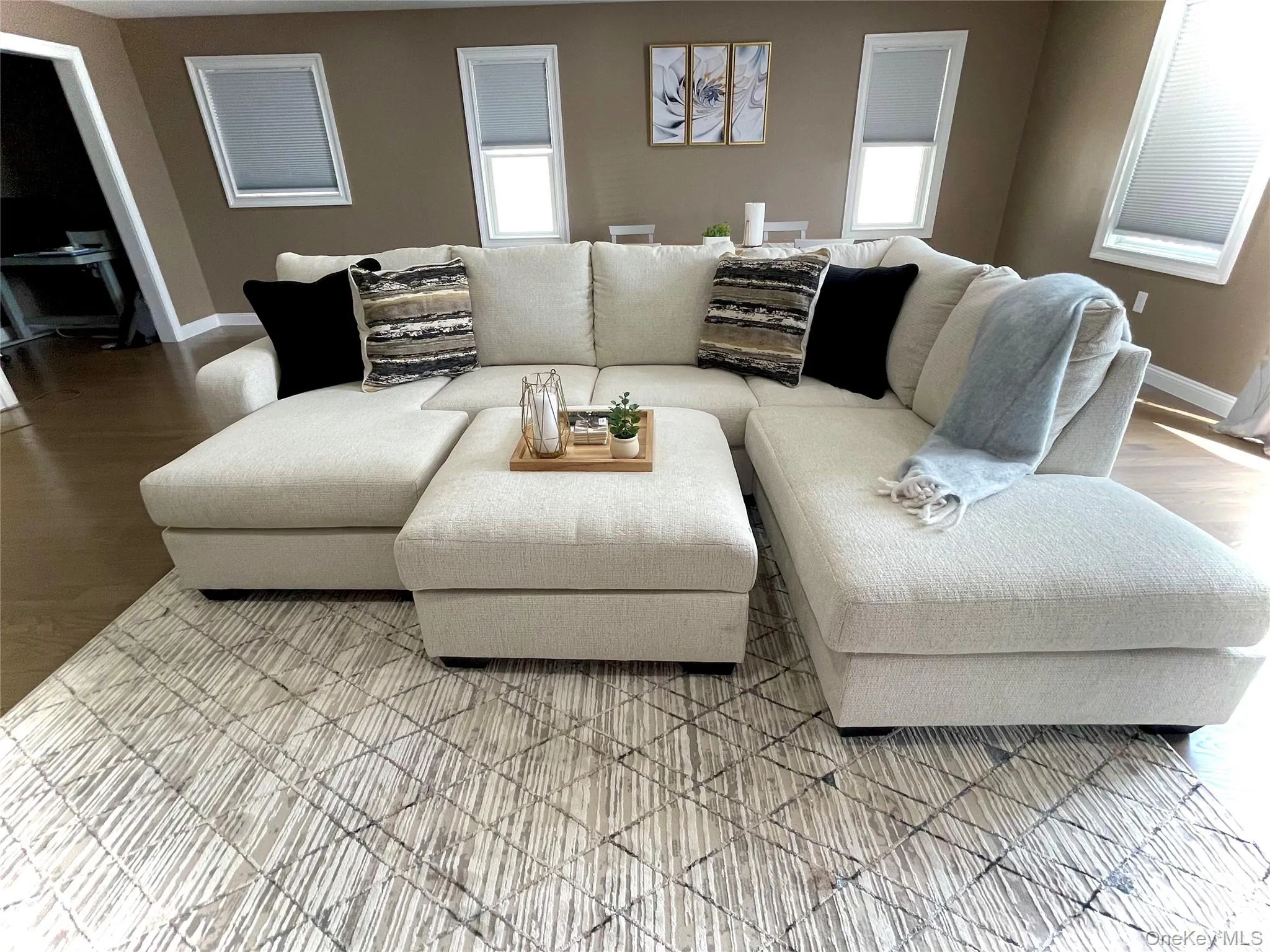 Living room with light wood-style floors Living room with light wood-style floors