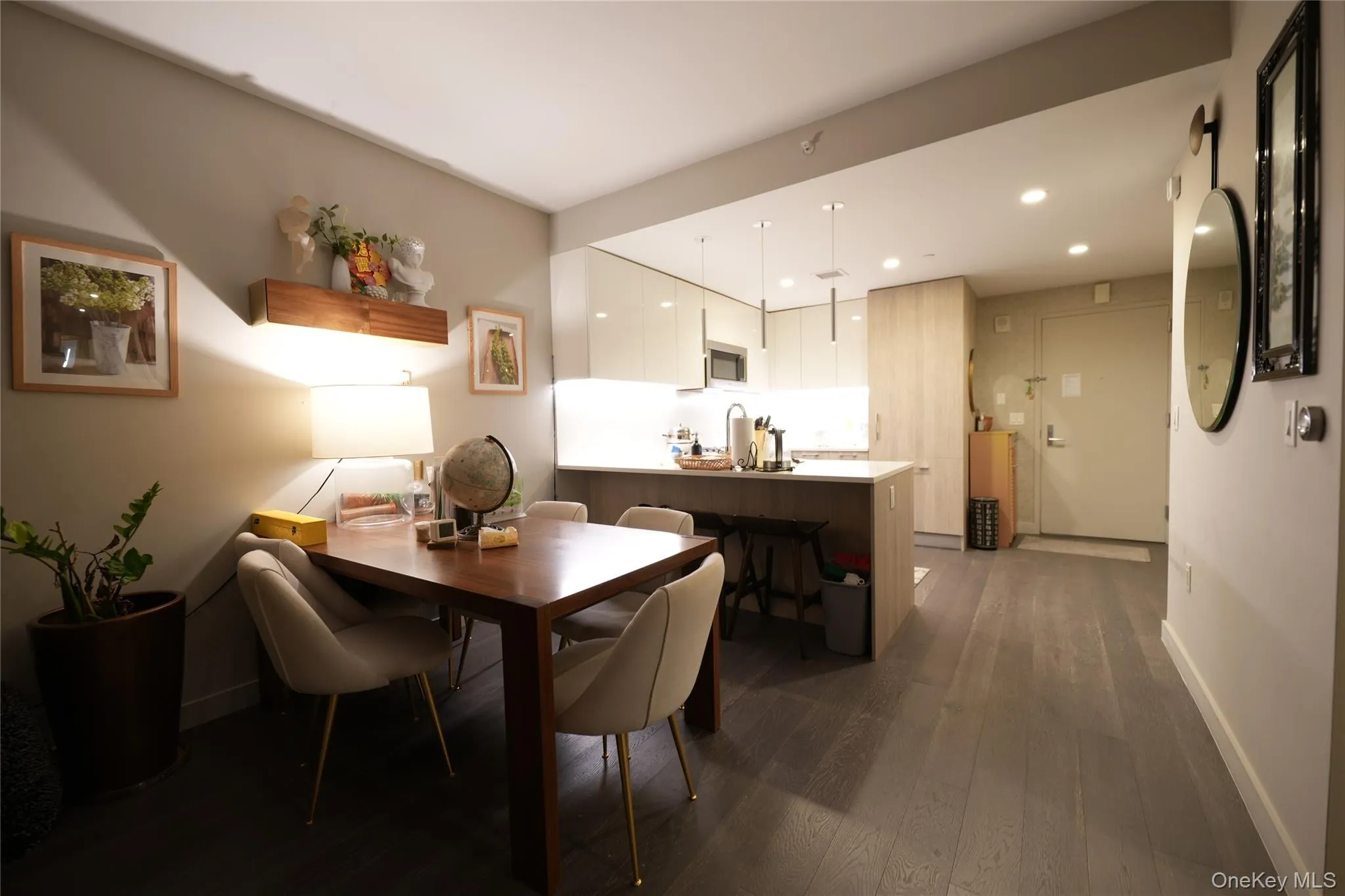 Dining room featuring recessed lighting and dark wood-style floors Dining room featuring recessed lighting and dark wood-style floors