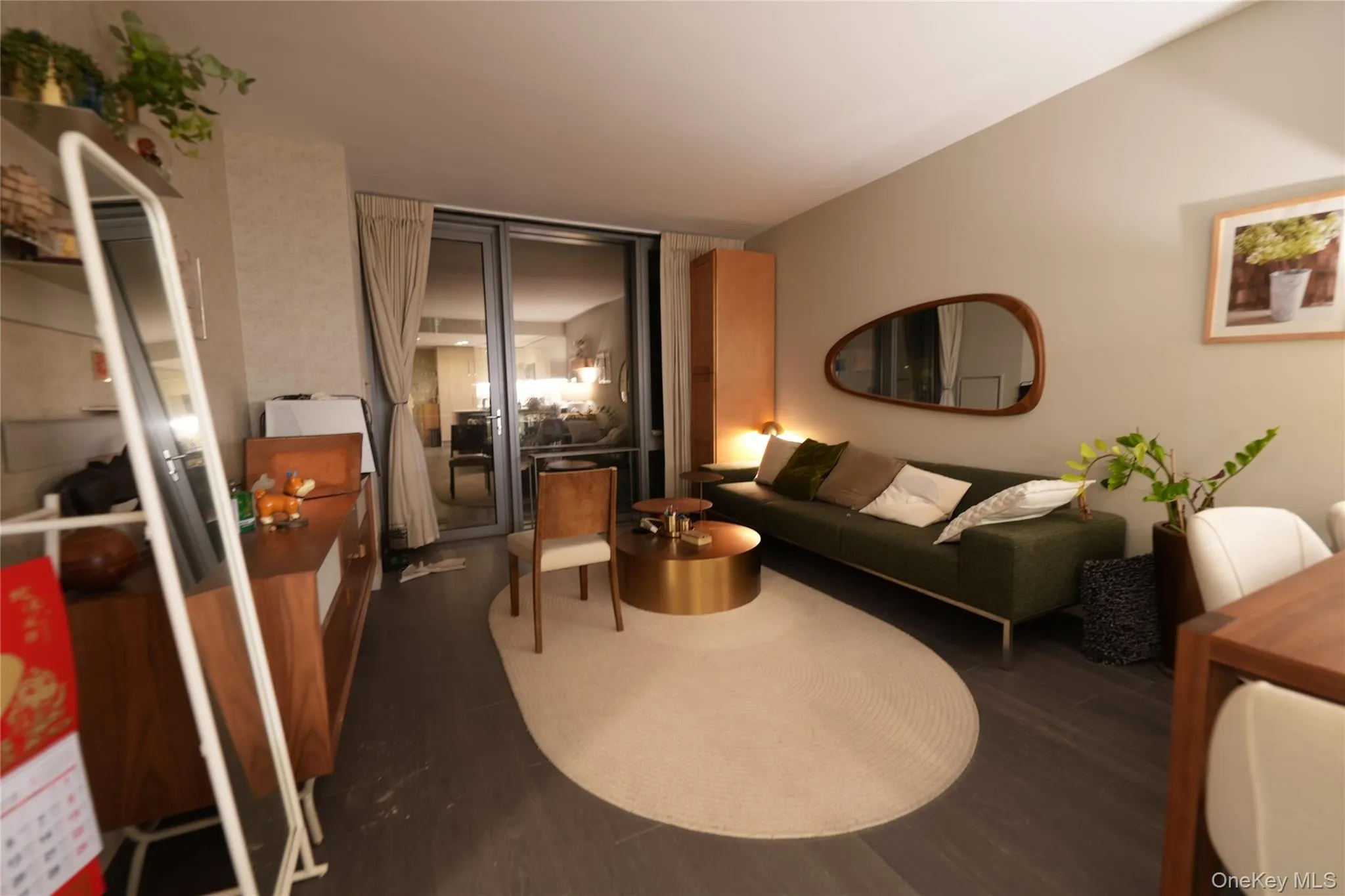 Living area with dark wood finished floors Living area with dark wood finished floors