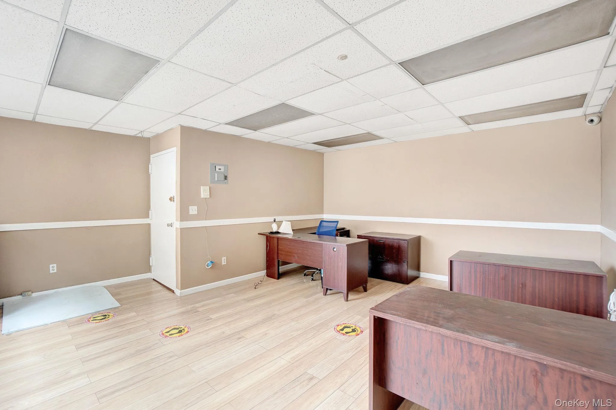 Office space featuring a paneled ceiling Office space featuring a paneled ceiling