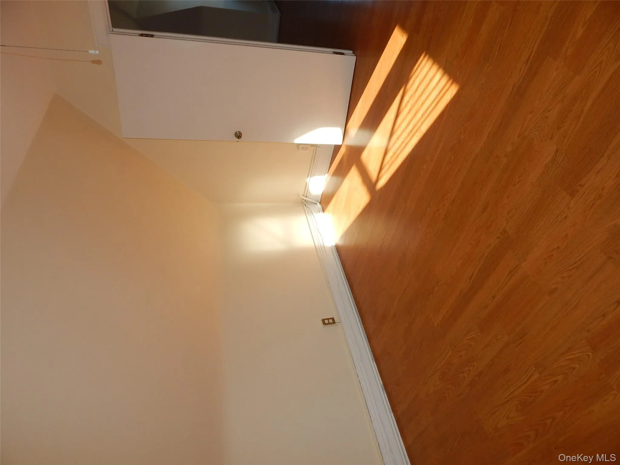 Bonus room with wood finished floors and lofted ceiling Bonus room with wood finished floors and lofted ceiling