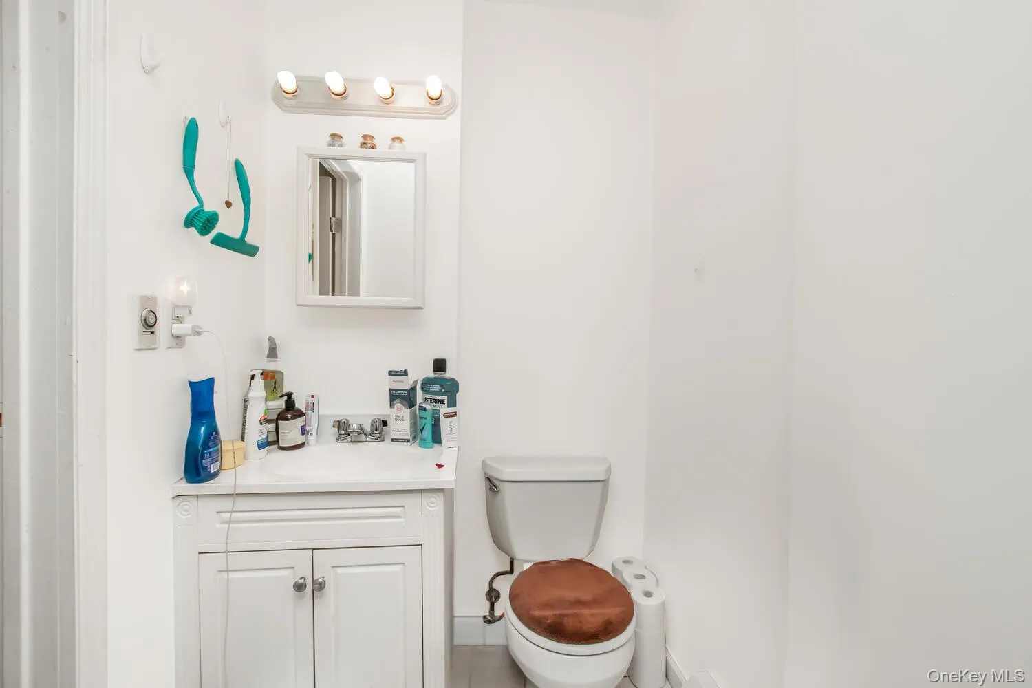 Bathroom featuring vanity and toilet Bathroom featuring vanity and toilet