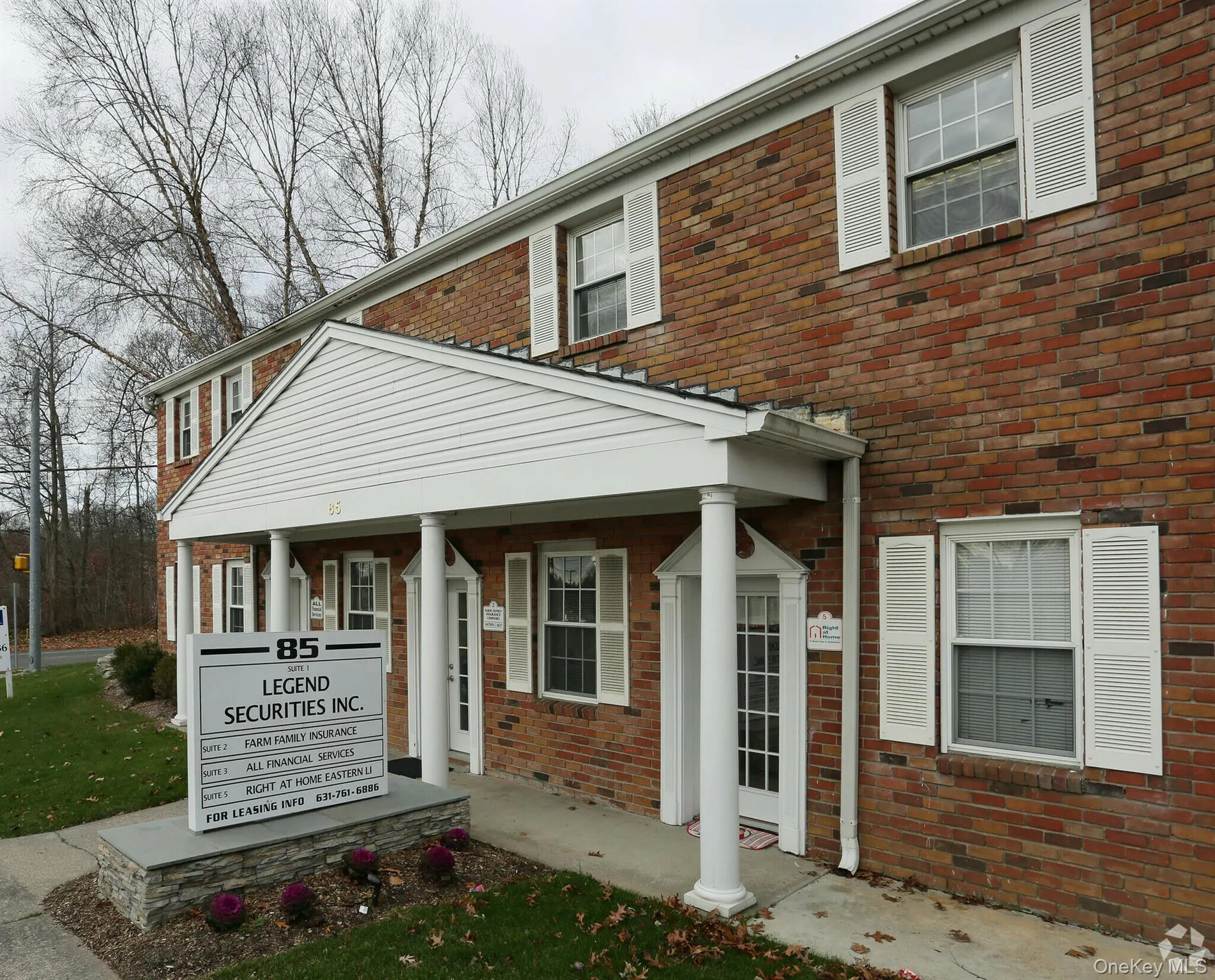 View of front of house with a porch and brick siding View of front of house with a porch and brick siding