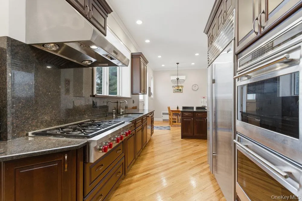Kitchen with granite counters and backsplash Kitchen with granite counters and backsplash