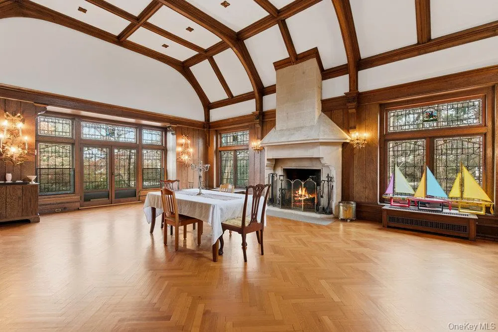 Banquet sized Dining room with high vaulted beamed ceilings, leaded glass windows with stained glass accents, original herringbone oak floors Banquet sized Dining room with high vaulted beamed ceilings, leaded glass windows with stained glass accents, original herringbone oak floors