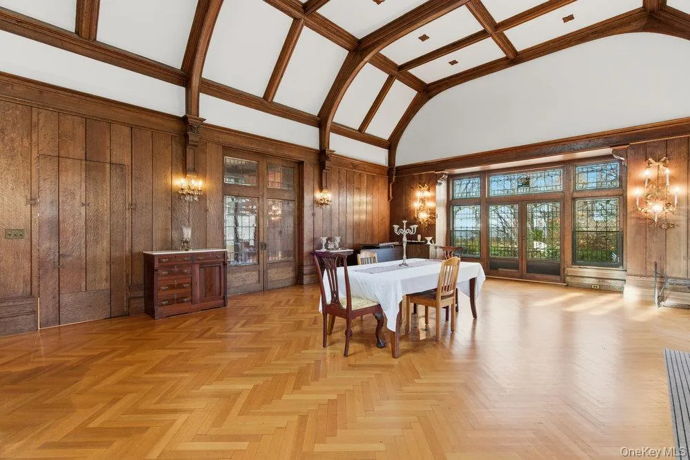 Banquet sized dining room with leaded glass french doors to patio, pocket doors to original entry foyer and kitchen access Banquet sized dining room with leaded glass french doors to patio, pocket doors to original entry foyer and kitchen access