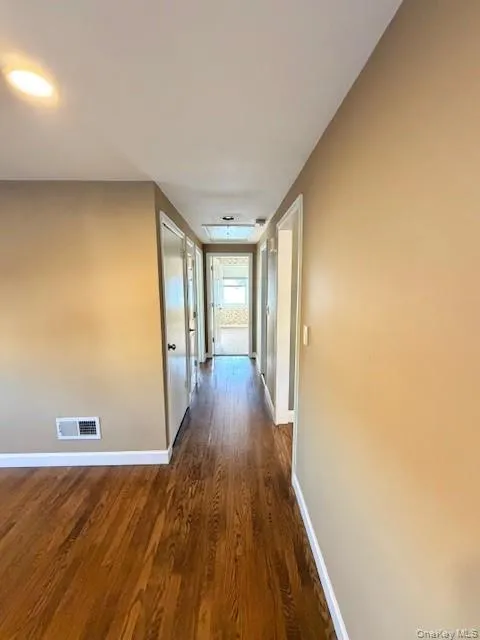 Hallway Off Living Room Featuring Entry, closet and Bedrooms Hallway Off Living Room Featuring Entry, closet and Bedrooms