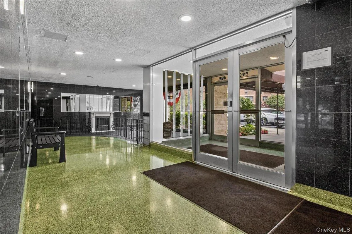 Community lobby featuring a textured ceiling Community lobby featuring a textured ceiling
