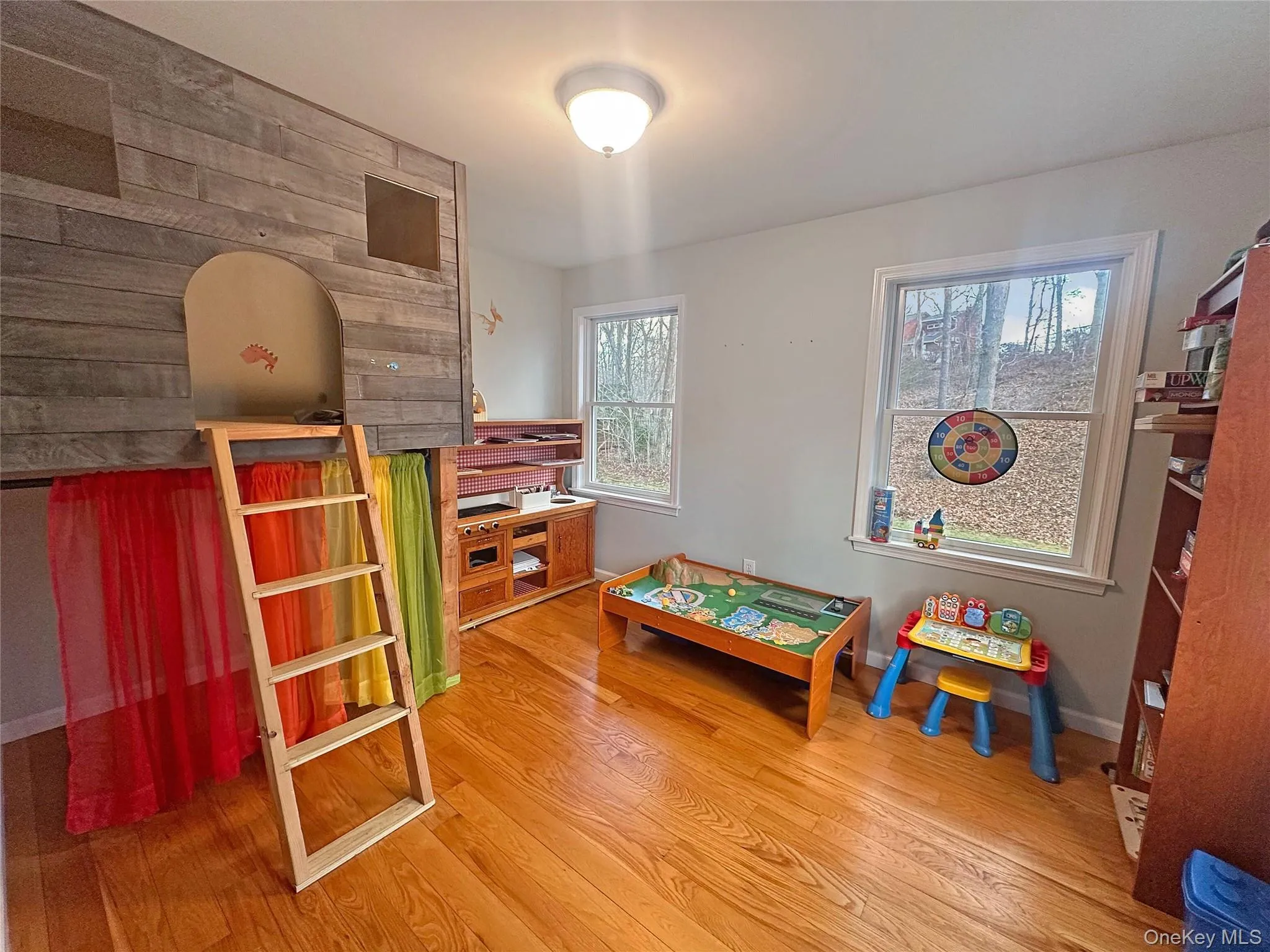 Game room featuring light wood finished floors and baseboards Game room featuring light wood finished floors and baseboards