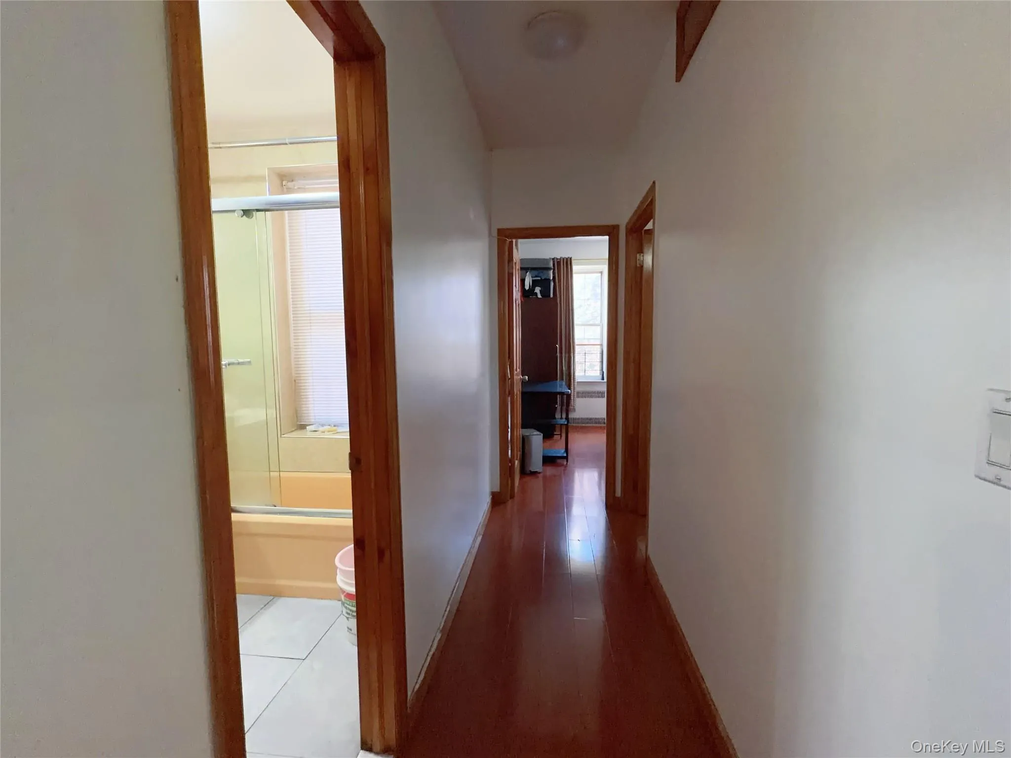 Hallway featuring baseboards Hallway featuring baseboards