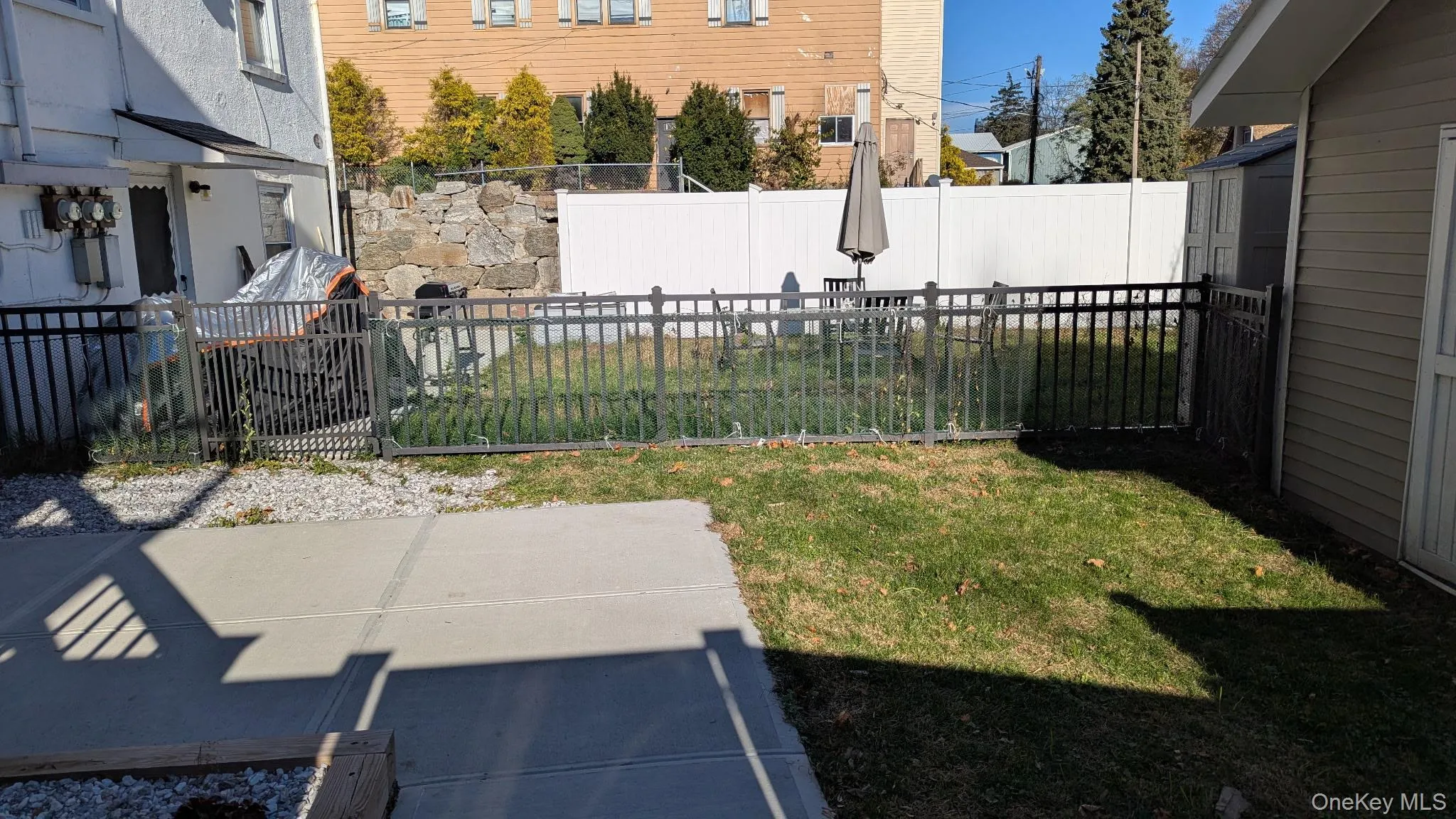 Fenced backyard featuring a patio Fenced backyard featuring a patio