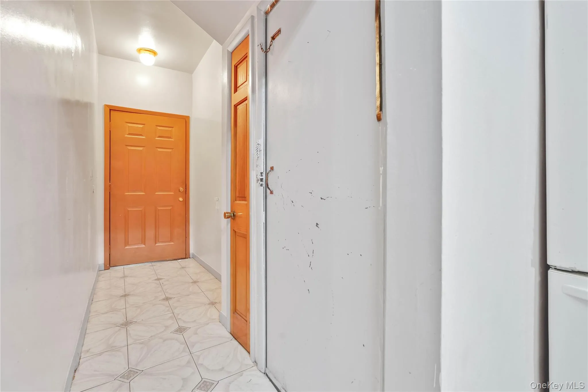 Hall with light flooring Hall with light flooring