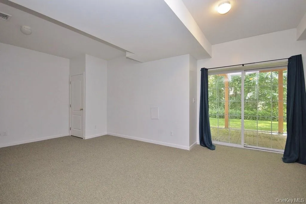 Finished basement, walk-out to patio and wooded rear yard Finished basement, walk-out to patio and wooded rear yard