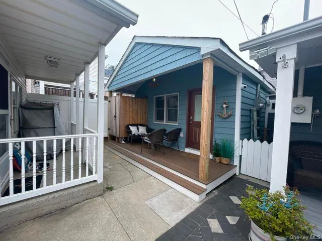 View of patio / terrace with a wooden deck View of patio / terrace with a wooden deck