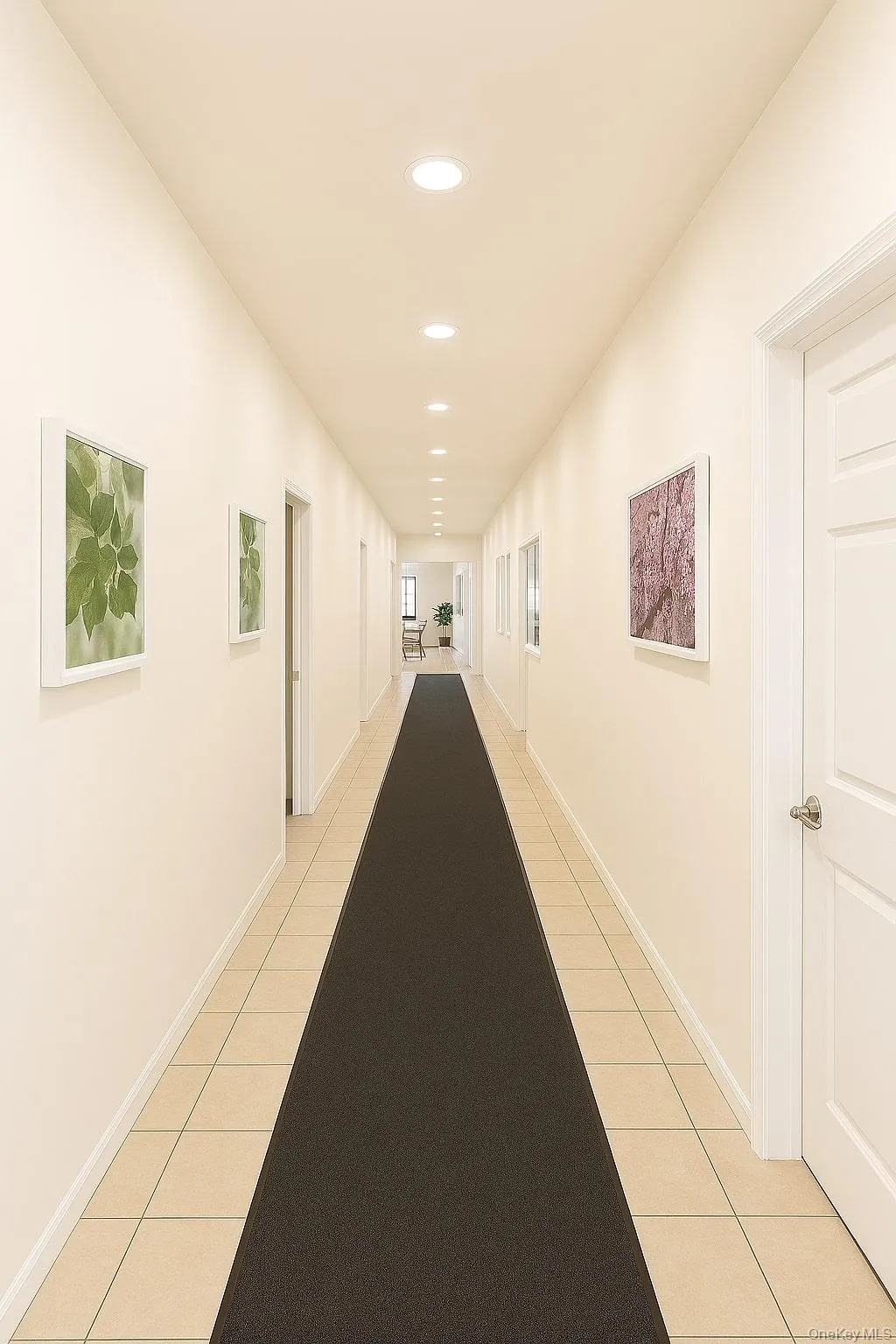 Hall featuring recessed lighting and light tile patterned flooring Hall featuring recessed lighting and light tile patterned flooring