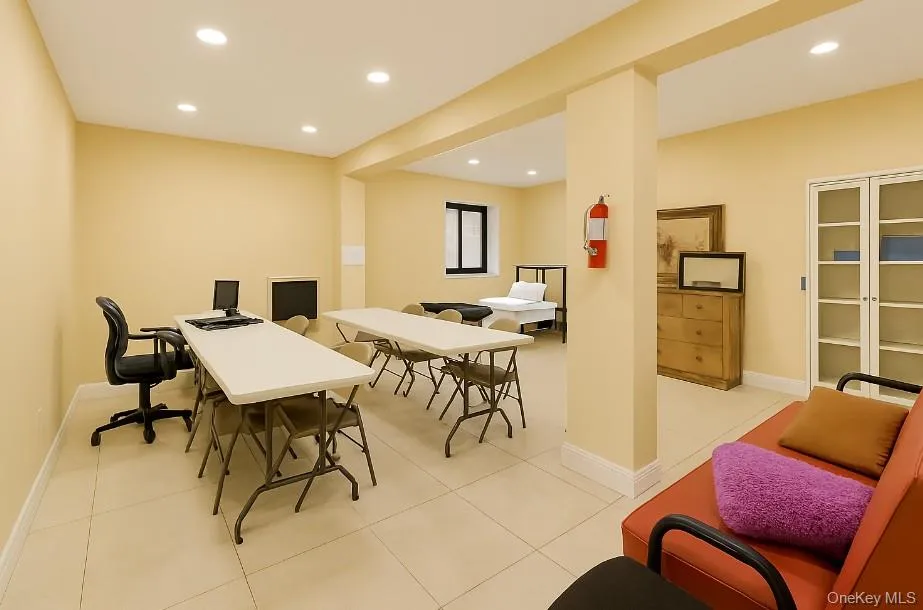 Home office with recessed lighting and light tile patterned flooring Home office with recessed lighting and light tile patterned flooring