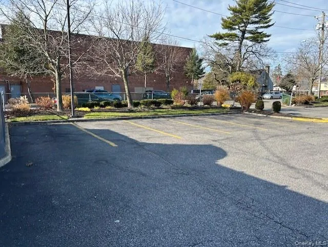 View of uncovered parking lot View of uncovered parking lot