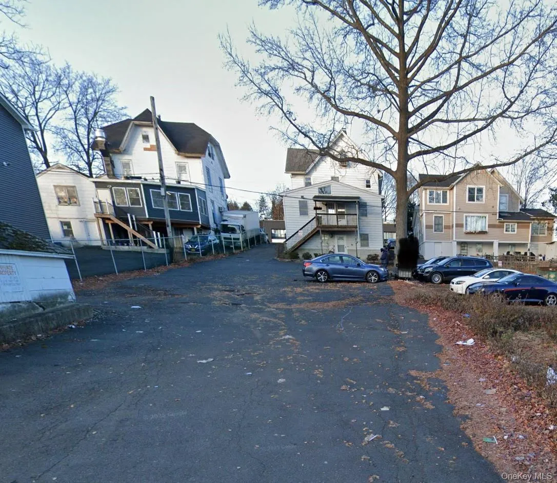 View of asphalt road with a residential view View of asphalt road with a residential view