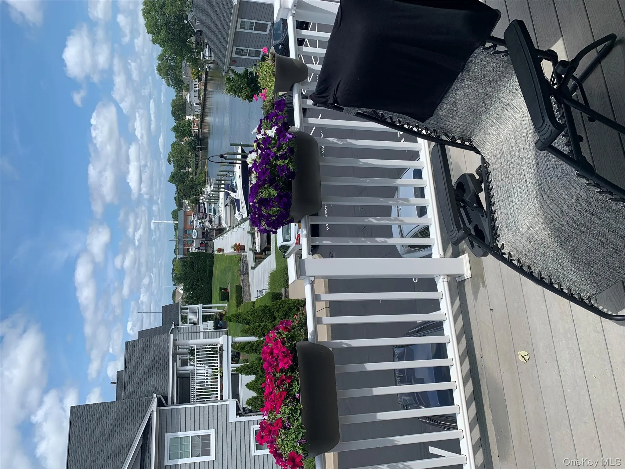 Deck featuring a water view Deck featuring a water view